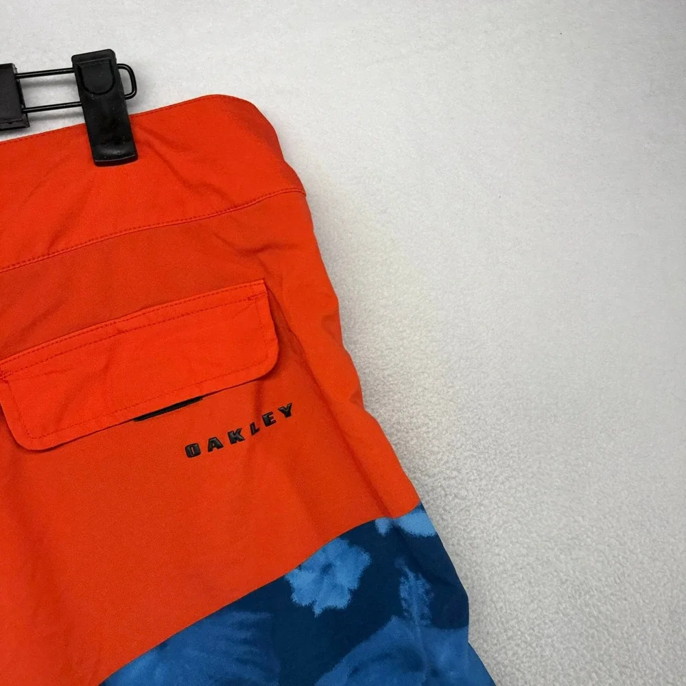 Oakley Board Shorts Men 33 Orange Blue Floral Performance Fit Swim Trunks Surf